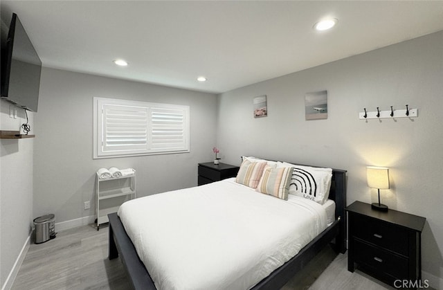 bedroom featuring light hardwood / wood-style flooring