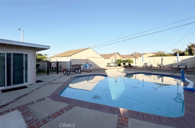 view of pool with a patio area