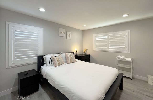 bedroom featuring light hardwood / wood-style flooring