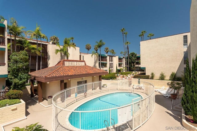 view of pool featuring a patio