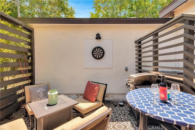 view of patio featuring outdoor dining space