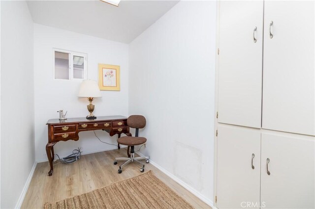 home office featuring light hardwood / wood-style flooring