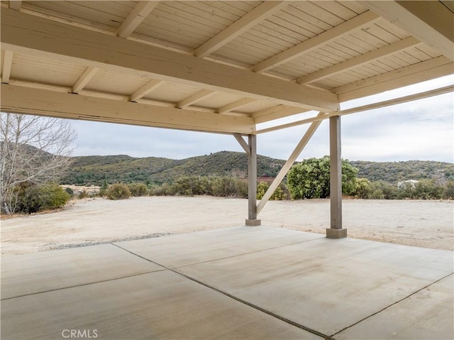 view of patio with a mountain view