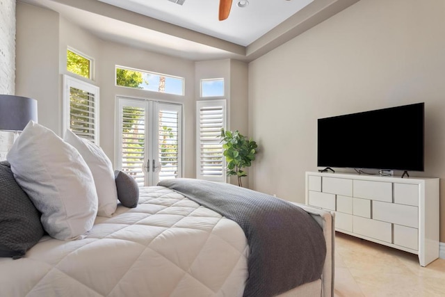 bedroom featuring french doors and ceiling fan