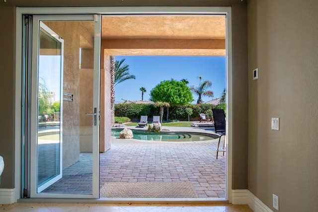 doorway featuring a wealth of natural light