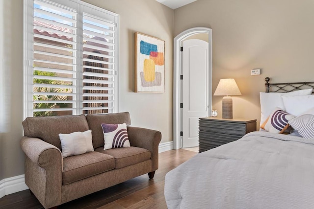 bedroom featuring dark wood-type flooring