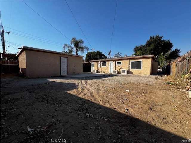 rear view of house featuring a patio