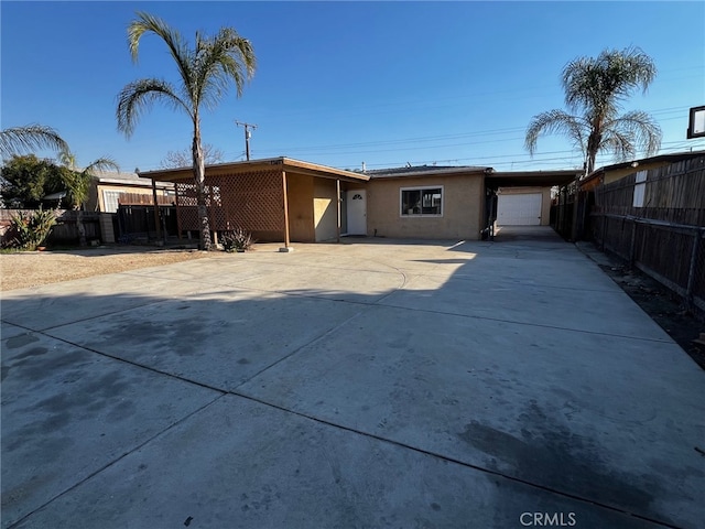 back of house with a garage