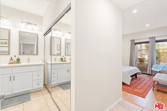 bathroom featuring vanity and tile patterned flooring