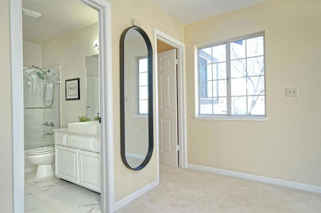 full bathroom with bathtub / shower combination, plenty of natural light, toilet, and vanity