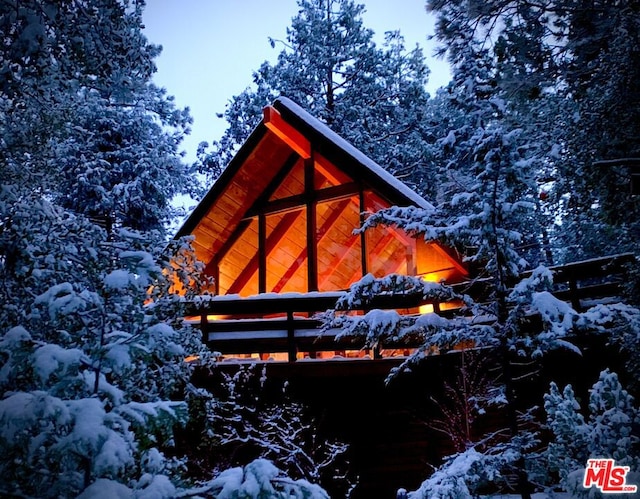 view of snow covered property