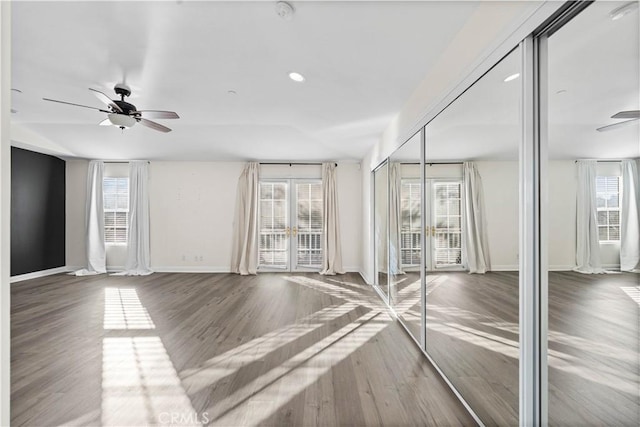 unfurnished room featuring wood-type flooring and ceiling fan