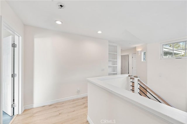 hall featuring light wood-type flooring