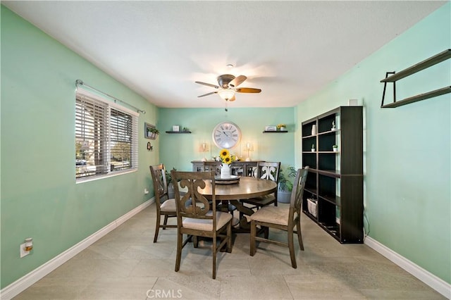 dining room with ceiling fan