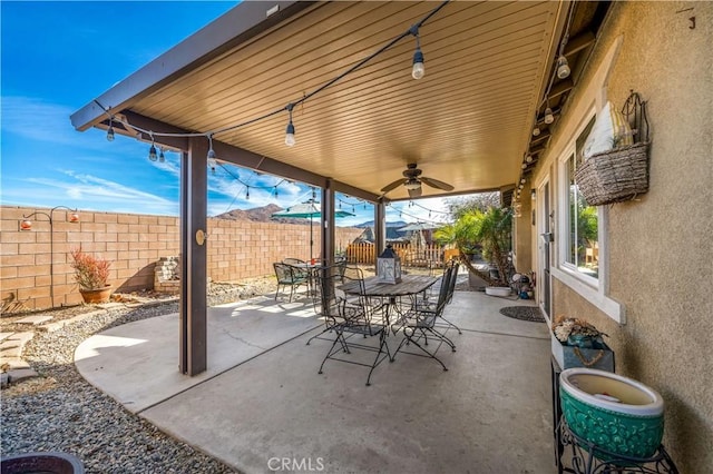 view of patio with ceiling fan