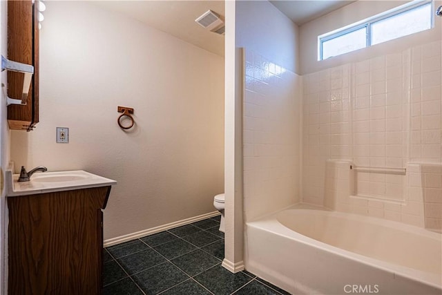 full bathroom with toilet, vanity, tile patterned floors, and  shower combination