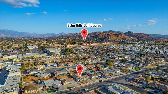 drone / aerial view featuring a mountain view