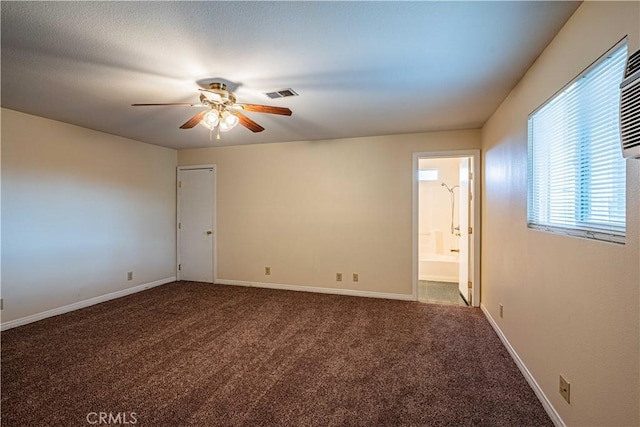 empty room with carpet and ceiling fan