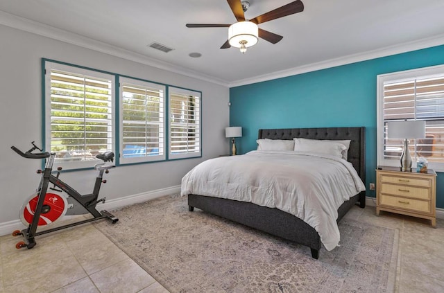 tiled bedroom featuring ceiling fan and crown molding