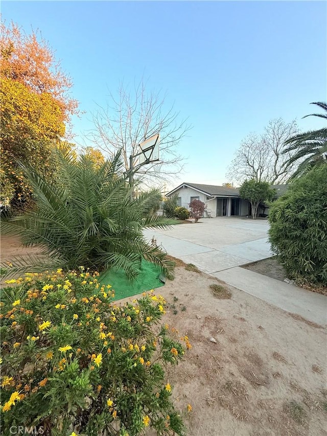 exterior space with a carport