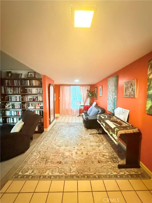 living area featuring tile patterned flooring