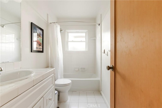 full bathroom with toilet, vanity, tile patterned flooring, and shower / bath combo with shower curtain