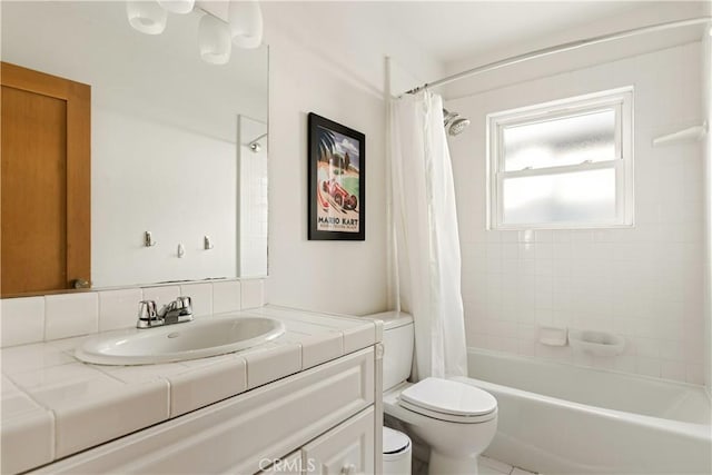 full bathroom featuring toilet, shower / tub combo, and vanity