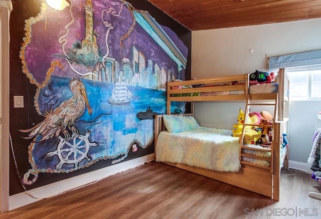 bedroom with wood-type flooring and wooden ceiling