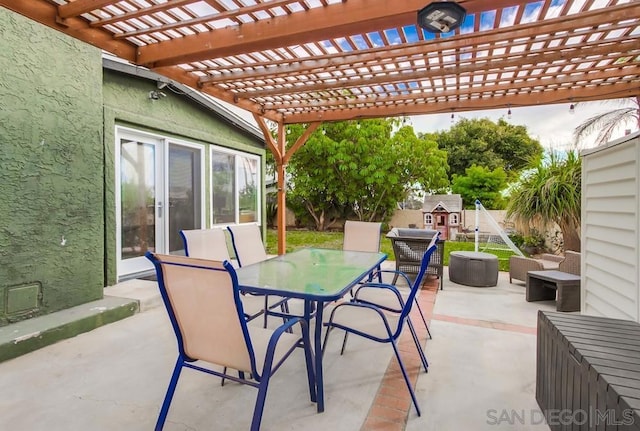 view of patio featuring an outdoor living space and a pergola