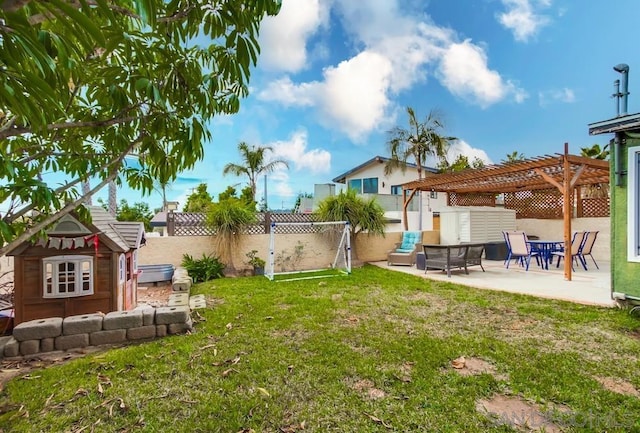 view of yard with a patio and a pergola