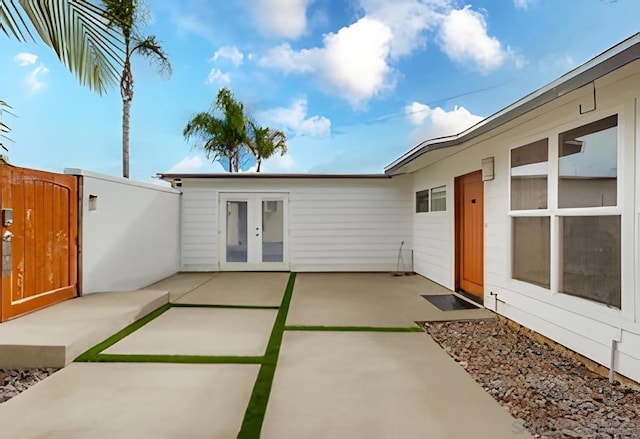 view of patio featuring french doors