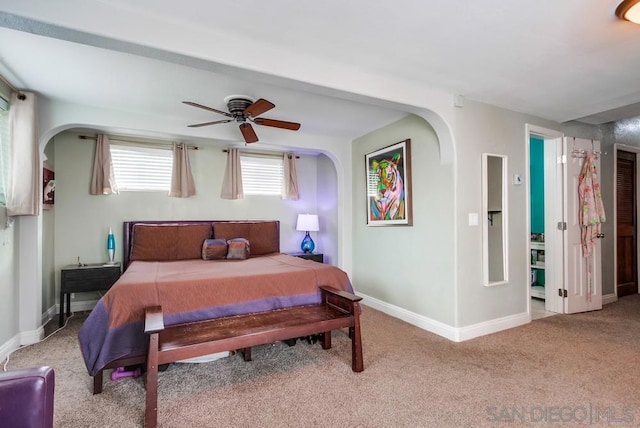 carpeted bedroom featuring ceiling fan