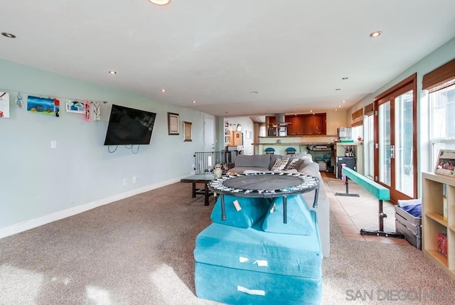 game room with light tile patterned flooring