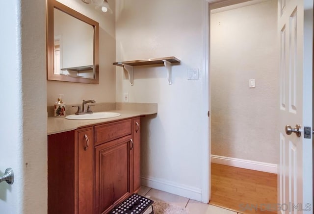 bathroom with vanity and tile patterned floors