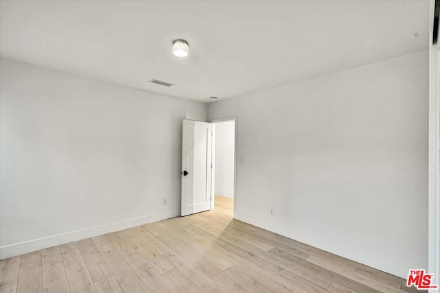 empty room featuring light wood-type flooring