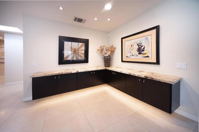 interior space featuring light tile patterned floors