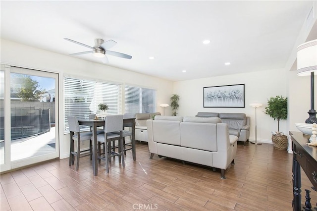 living room with ceiling fan