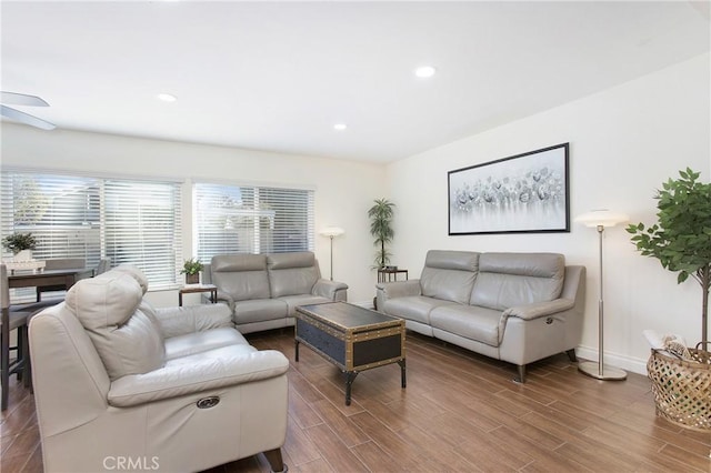 living room featuring ceiling fan