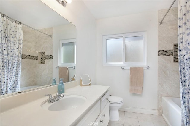 full bathroom with tile patterned flooring, vanity, a healthy amount of sunlight, and toilet