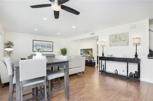 dining space featuring ceiling fan