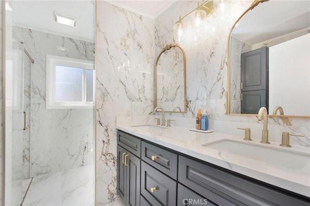 bathroom with a shower with shower door and vanity