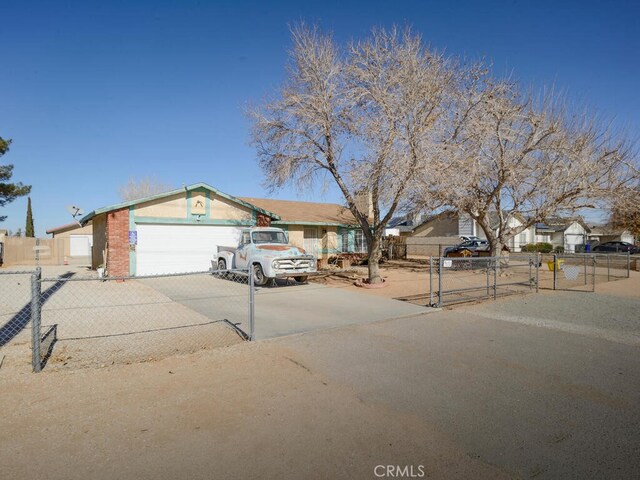 single story home featuring a garage