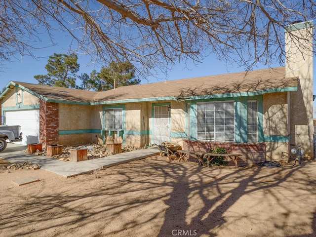 ranch-style house with a garage