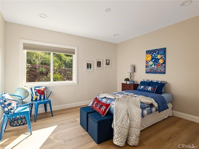 bedroom featuring light hardwood / wood-style flooring