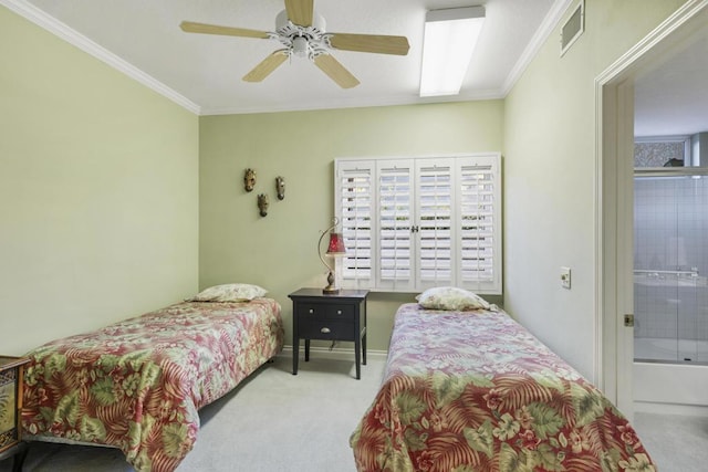 carpeted bedroom with ceiling fan and ornamental molding