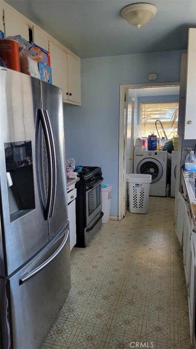 kitchen with white cabinets, stainless steel refrigerator with ice dispenser, separate washer and dryer, and gas stove