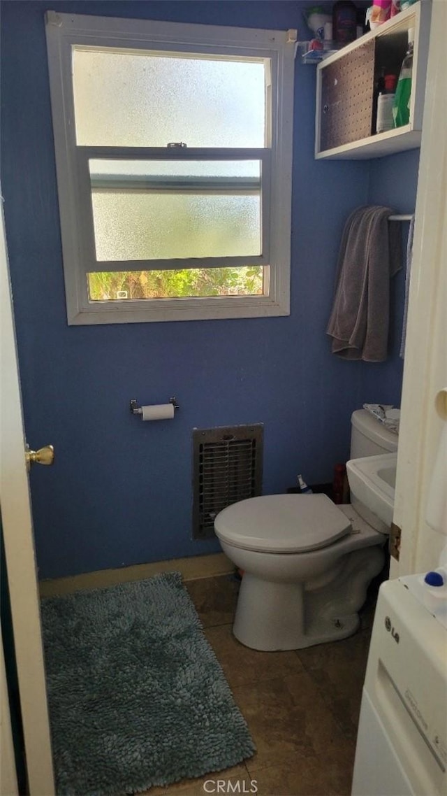 bathroom featuring toilet