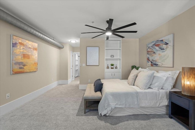 bedroom featuring light carpet and ceiling fan