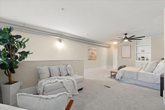 bedroom with ceiling fan and carpet flooring