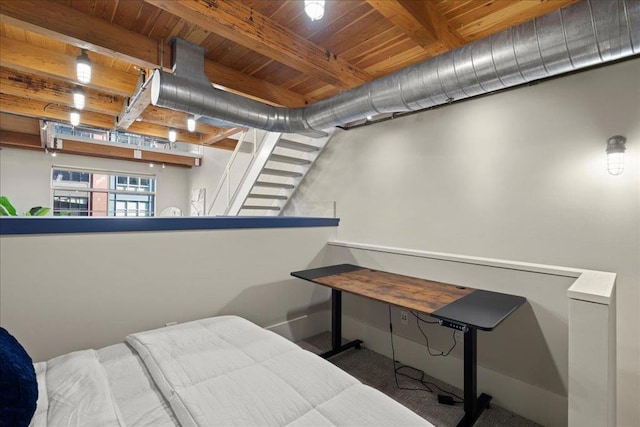 bedroom featuring wood ceiling and beamed ceiling